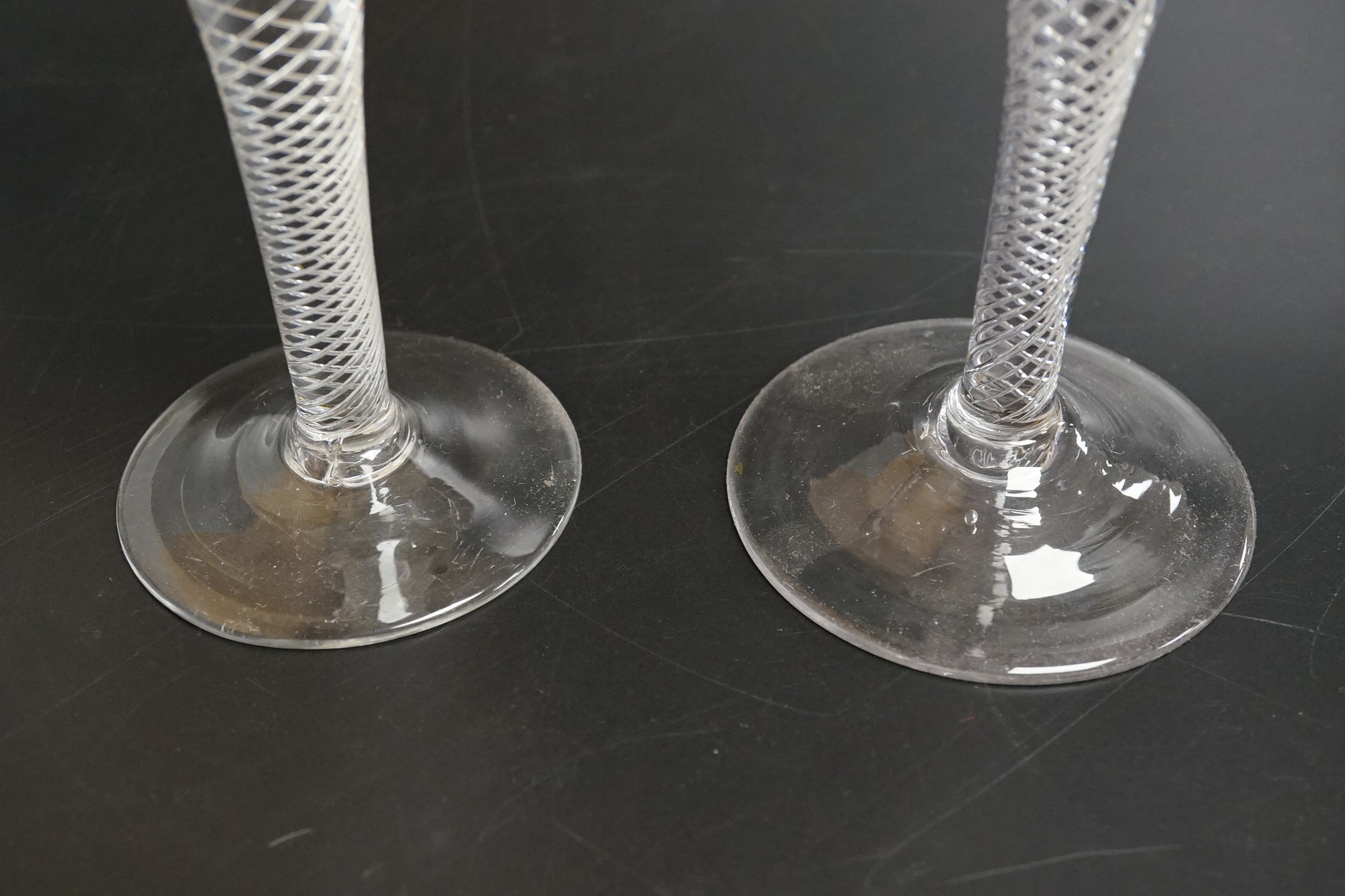 Two air twist stem funnel bowl wine glasses, c.1745, tallest 18.5cm high